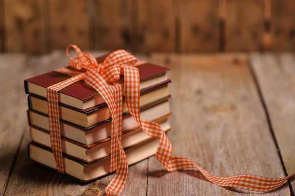 books wrapped in ribbon 